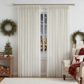 Vision Home pinch-pleated curtains filter sunlight while preserving privacy.