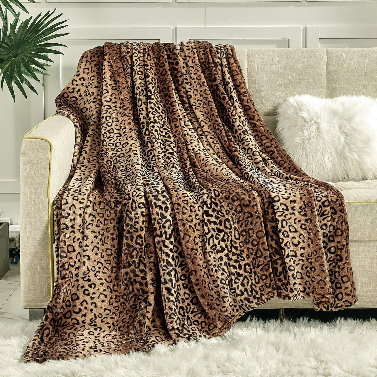 Viviland leopard-print fleece blanket on king bed adds luxurious warmth.