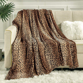 Viviland leopard-print fleece blanket on king bed adds luxurious warmth.