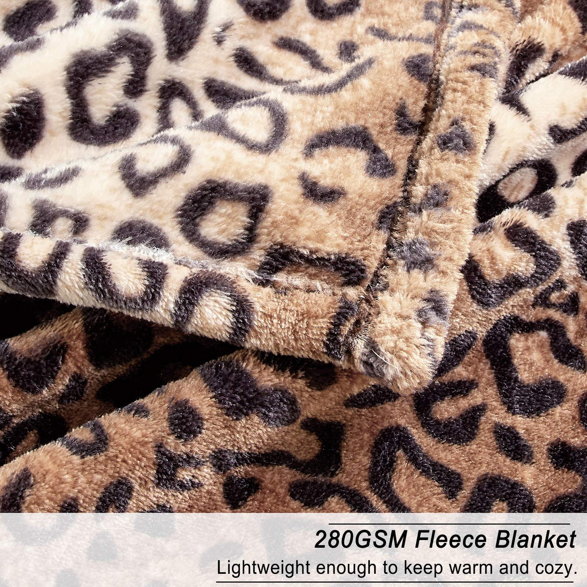 King-size blanket draped over sofa provides year-round comfort.
