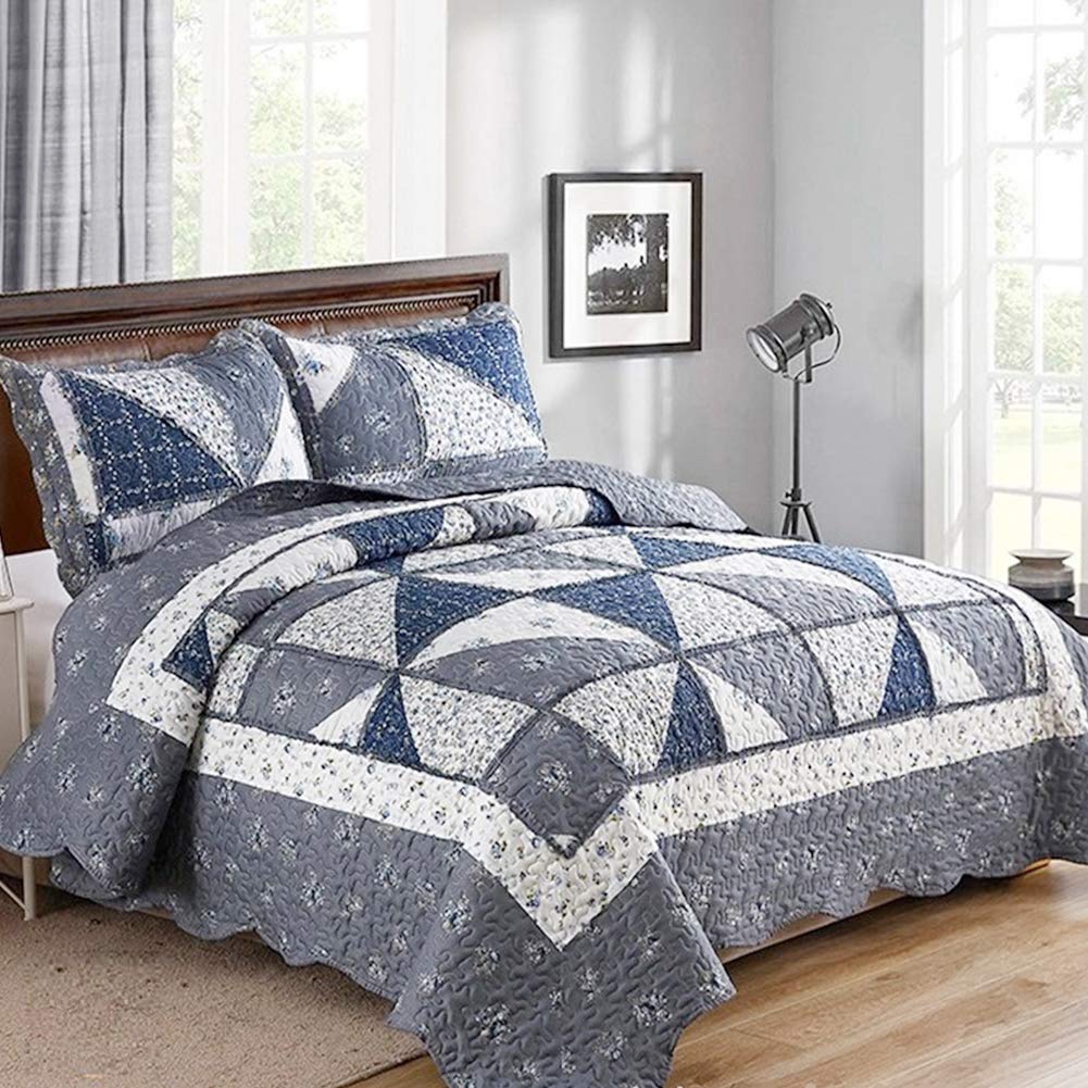 VIVILINEN oversized king grey floral patchwork quilt on a bed adds all-season style