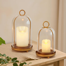VIVIRENOIR glass hurricane candle holder front view with antique brass finish and clear glass.