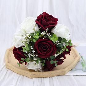 Vkkperp lace and jute ribbon on bouquet handle adds texture.