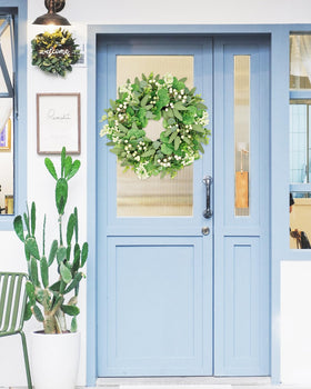Vlorart wreath hung on a door adds instant seasonal charm.