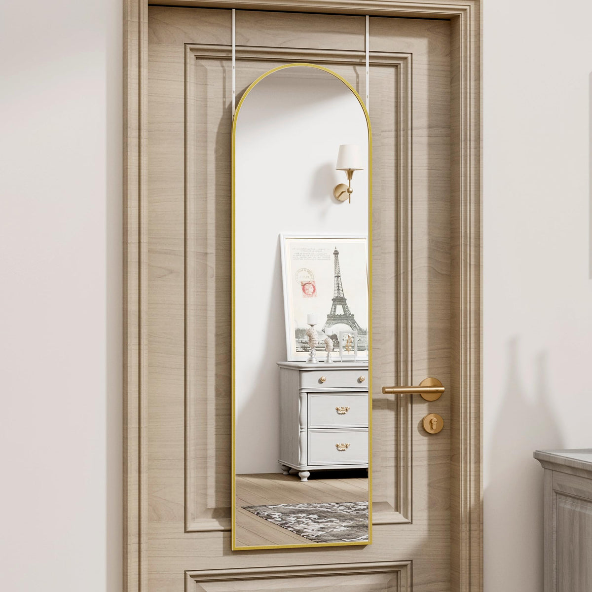 Vlush door mirror arch design in gold enhances entryway dressing and décor.