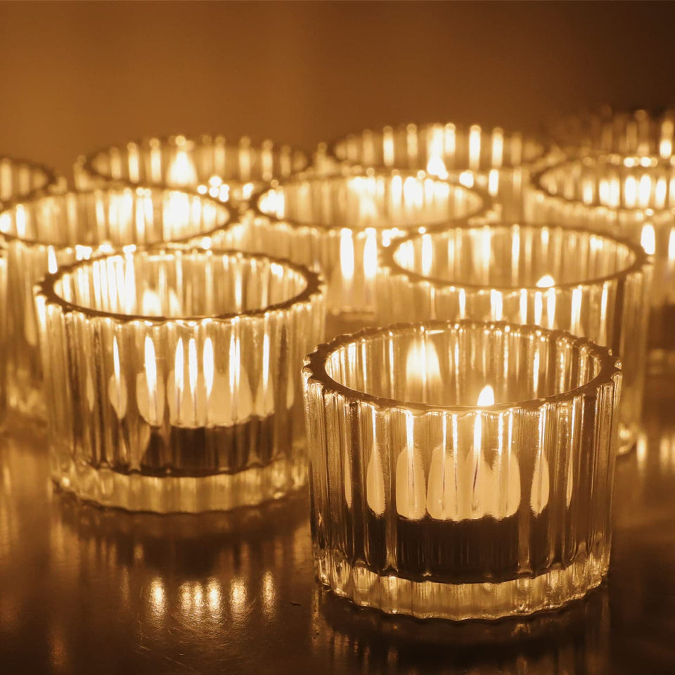 VOHO clear tealight holder 12-pack showcases transparent glass for elegant table lighting.
