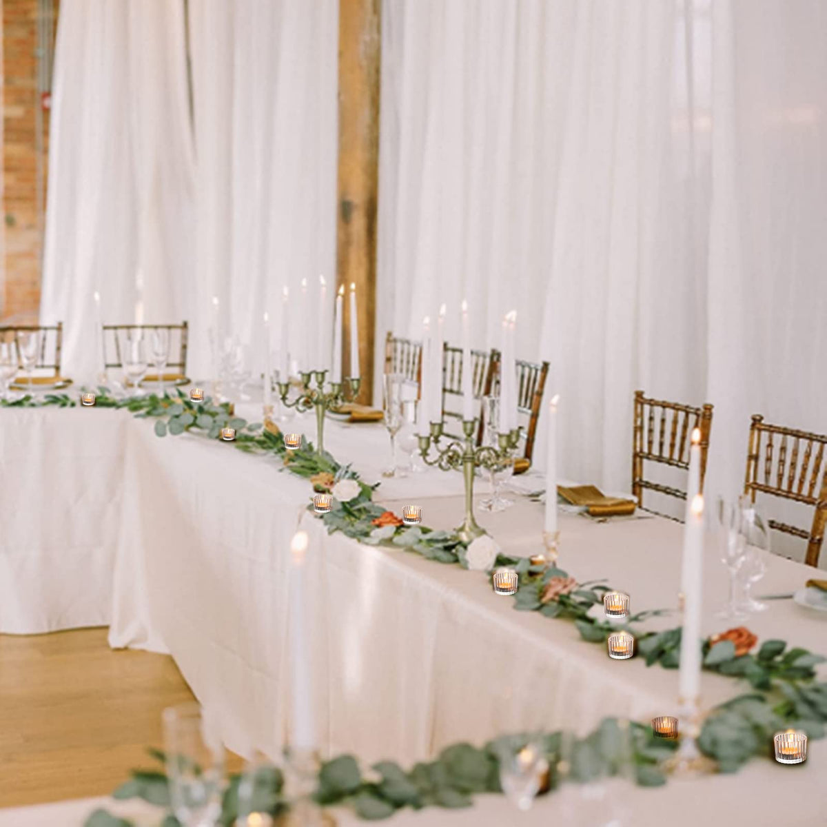 VOHO embossed clear tealight holder creates a romantic wedding centerpiece.