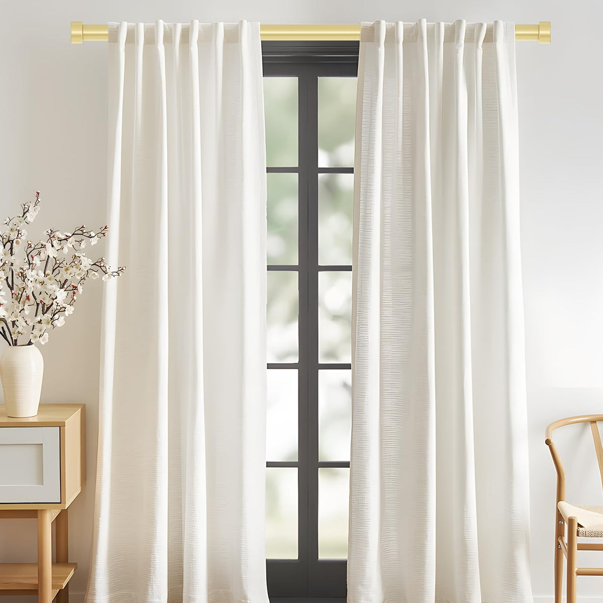 VOIIY 1-inch diameter gold curtain rod close-up highlights sturdy steel construction.