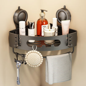 Voldra corner shower caddy with suction cup safely holding toiletries.
