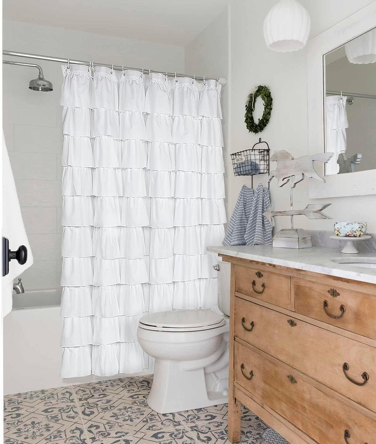 Volens white shower curtain measures about 70x70 inches for standard tubs.