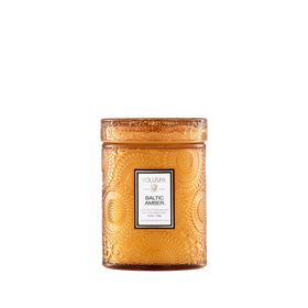 Voluspa Baltic Amber candle jar creates a warm atmosphere for intimate evenings.