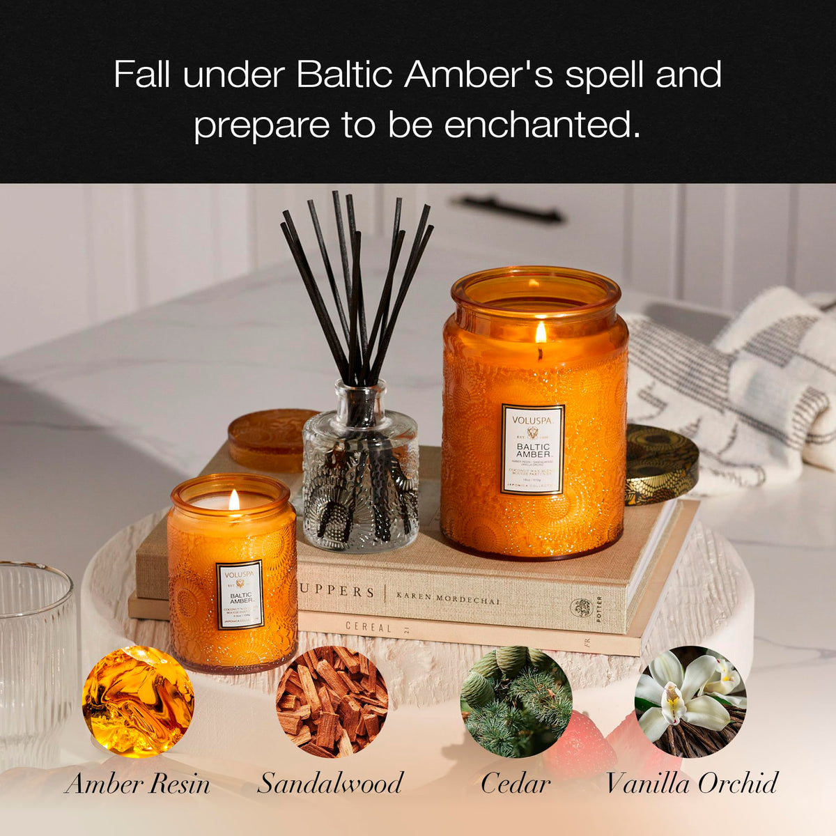 Voluspa Baltic Amber emphasizes cedar and vanilla orchid warmth in a decorative jar.