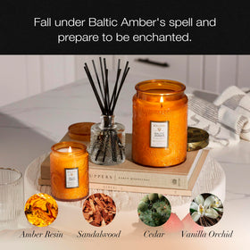 Voluspa Baltic Amber emphasizes cedar and vanilla orchid warmth in a decorative jar.