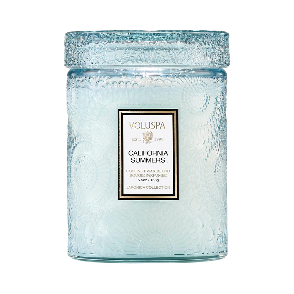 Voluspa California Summers candle jar with embossed glass adds refined ambience to a room