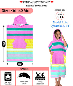 VOOVA & MOVAS hooded towel robe at the beach; oversized comfort for sunny days.