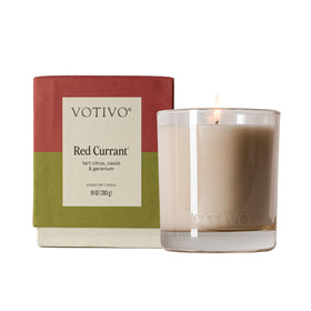 Votivo Red Currant 10oz Signature Candle in a stylish glass jar emiting refined ambience