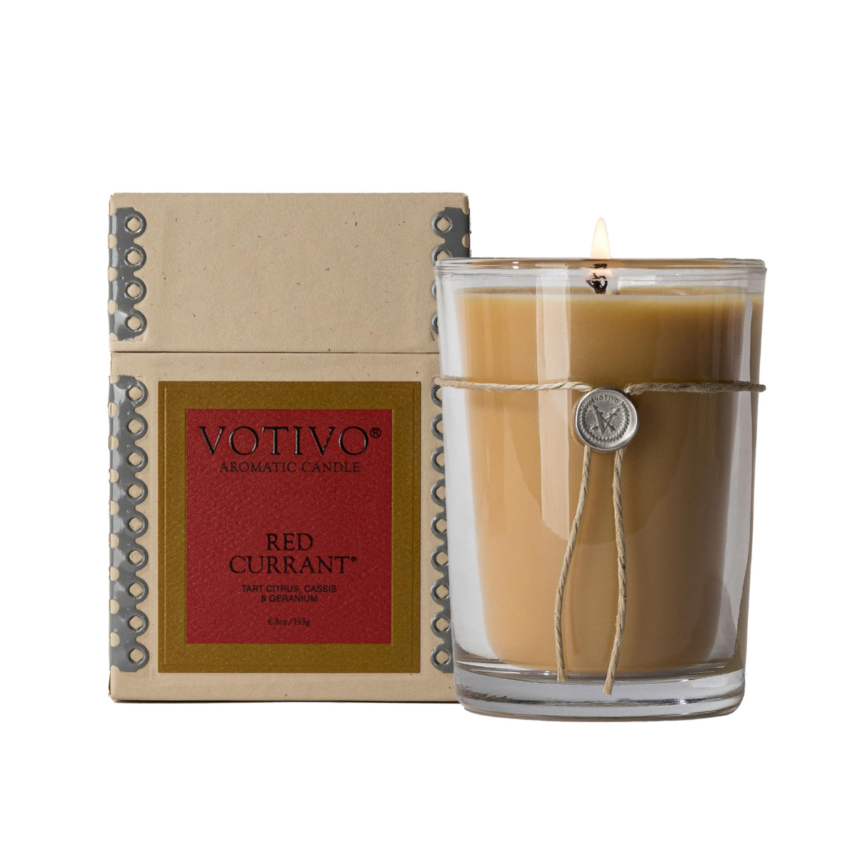 Votivo Red Currant 6.8 oz candle in a luxury glass jar for enduring fragrance.
