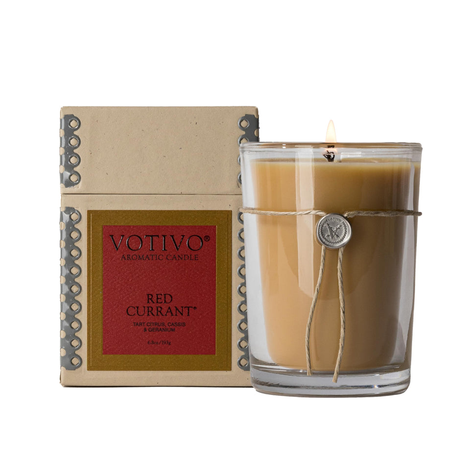 Votivo Red Currant 6.8 oz candle in a luxury glass jar for enduring fragrance.