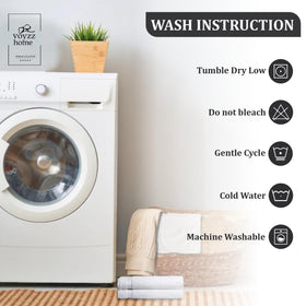 Voyzz Home two-mat set in white finish fits any bathroom.