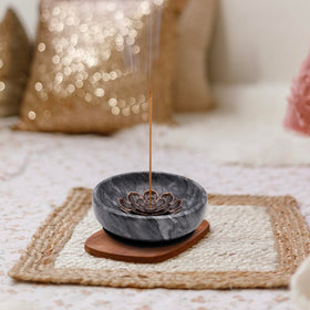 Vrupin marble stick incense holder with lotus motif for organized aromatics.