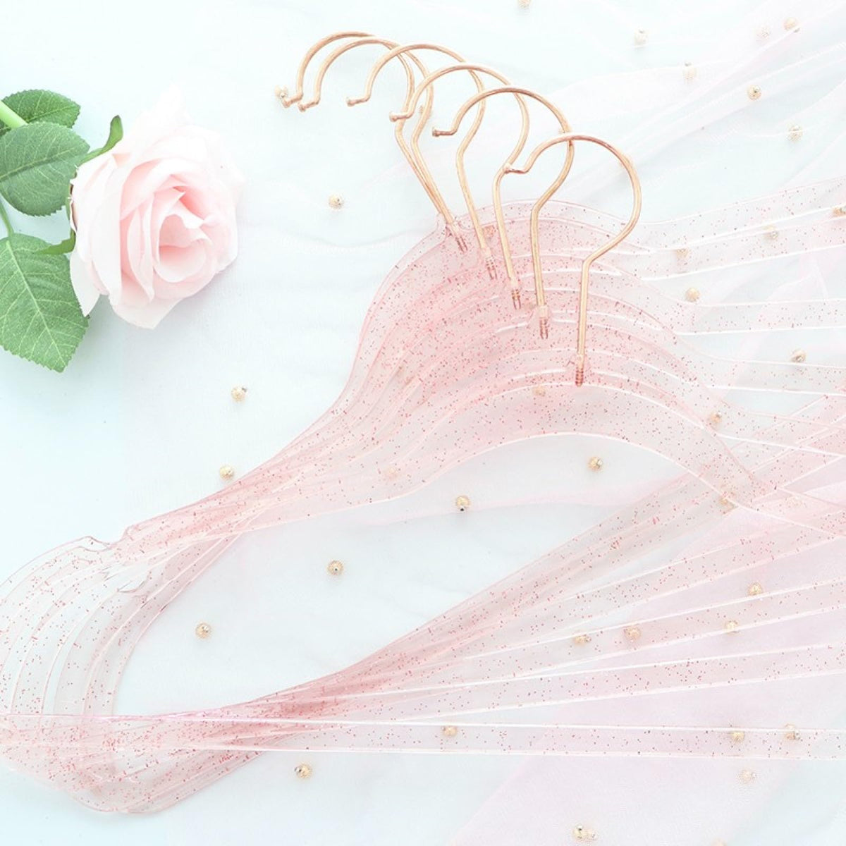 VSV Storage glitter-gold accent hanger adds premium look while organizing outfits.