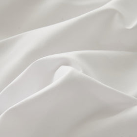 VTNXUN white bed skirt enhances a tidy, finished bedroom aesthetic