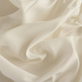 VTNXUN ivory bed skirt on a queen bed showing full bed look