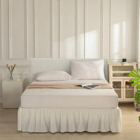 VTNXUN ivory bed skirt conceals box spring and bed frame neatly