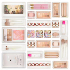 Vtopmart 25-piece drawer organizers neatly arranges cosmetics in a vanity.