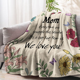 VZITSQS blanket helps mom relax in bed or on the sofa with plush warmth.