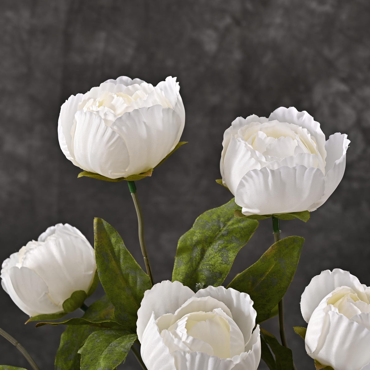 Waipfaru DIY centerpiece with white peonies adds volume and sophistication.