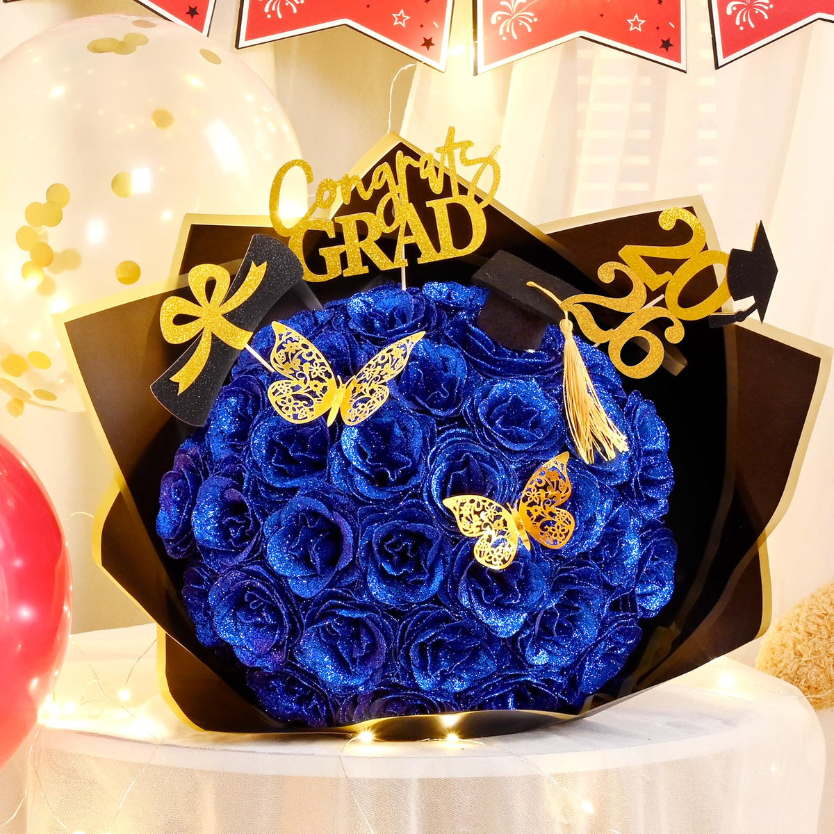 Waipfaru graduation crown decor enhances the display.