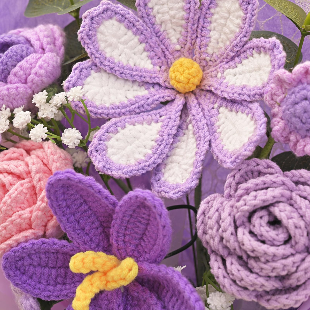 Waipfaru purple crochet mix of roses, tulips, daisies, with varied textures.