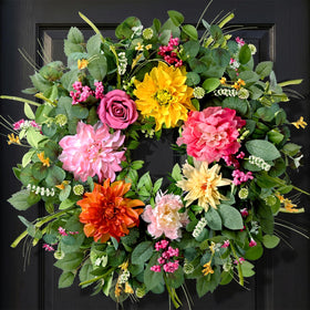 Waipfaru Spring Wreath on front door with lifelike blooms for a welcoming entry