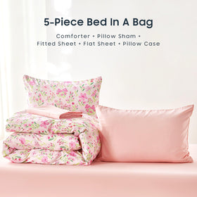 Wake In Cloud 5-piece kids bed in a bag set neatly displayed.