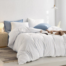 Corner ties inside the Wake In Cloud duvet cover secure the duvet insert during sleep.