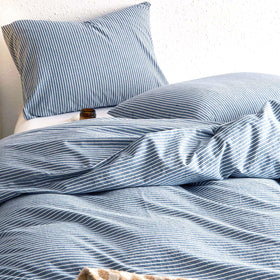 Wake In Cloud striped cotton duvet cover in denim blue for breathable comfort