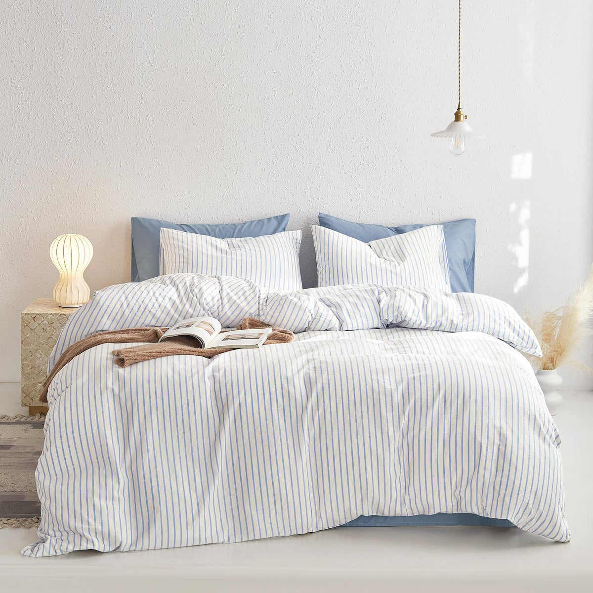 Close-up of vertical ticking stripe pattern on Wake In Cloud duvet cover.