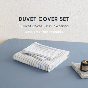 Texture of 100% washed cotton in Wake In Cloud bedding close-up for durability and softness.