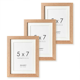 Wallwisy wood frame 5x7 oak showcases photos with a natural finish.
