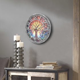 WANGIRO Tree of Life wall clock displayed in a living room setting.