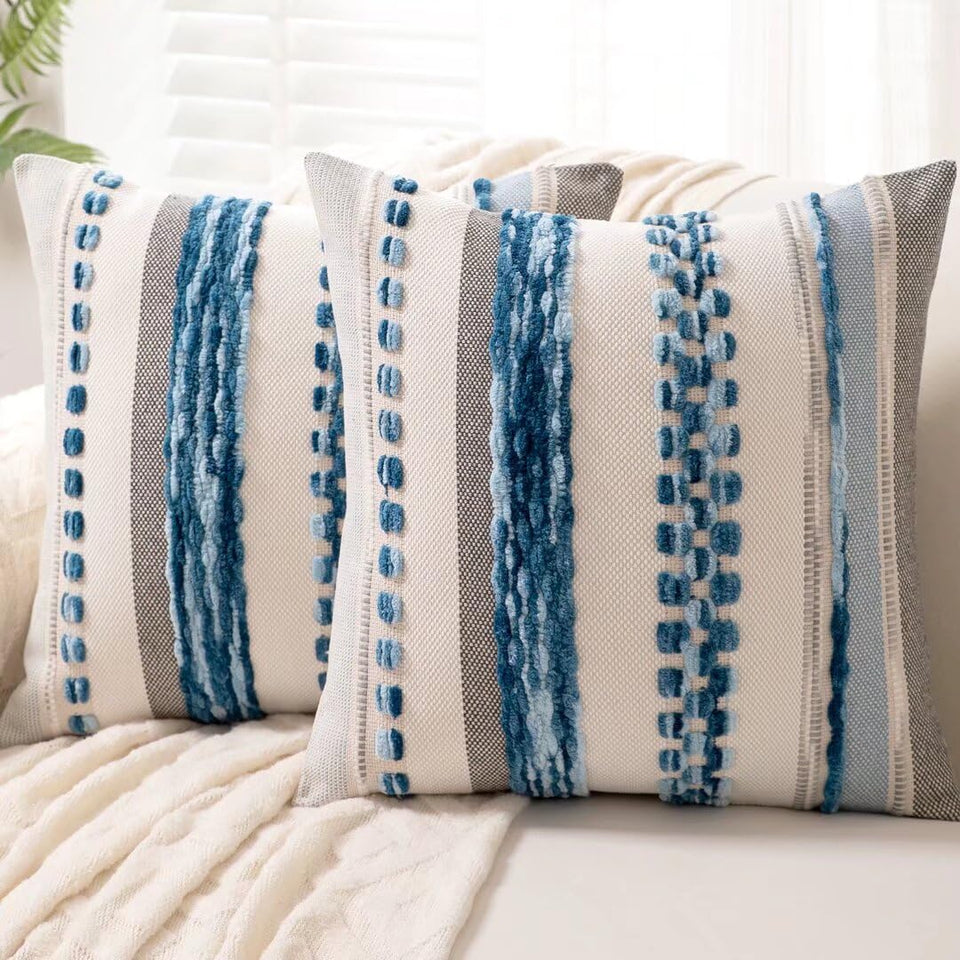 WANLIRD boho stripe-front chenille pillow cover adds cozy sofa texture.