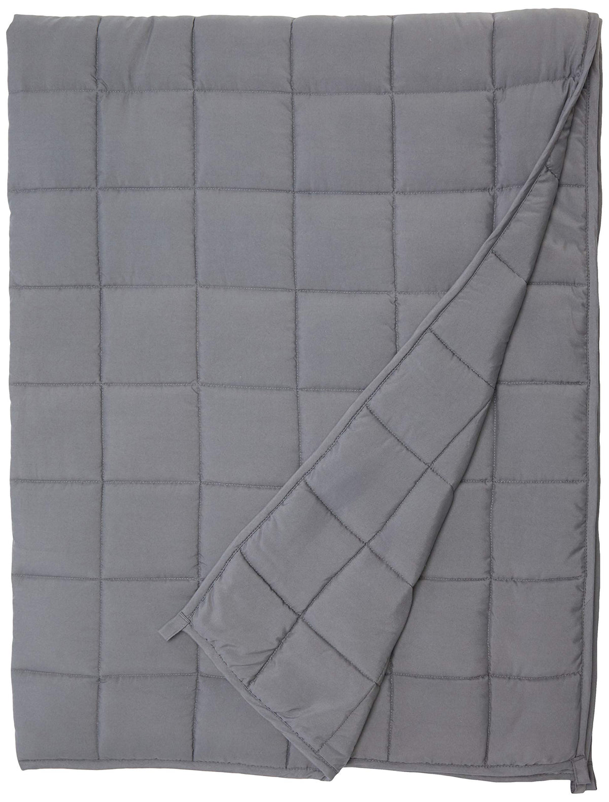 Waowoo blanket shown on bed with soft, breathable fabric.