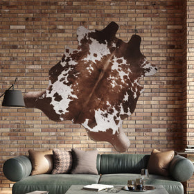 Warm Haven cow-hide rug care guide highlights simple cleaning and air-drying benefits.
