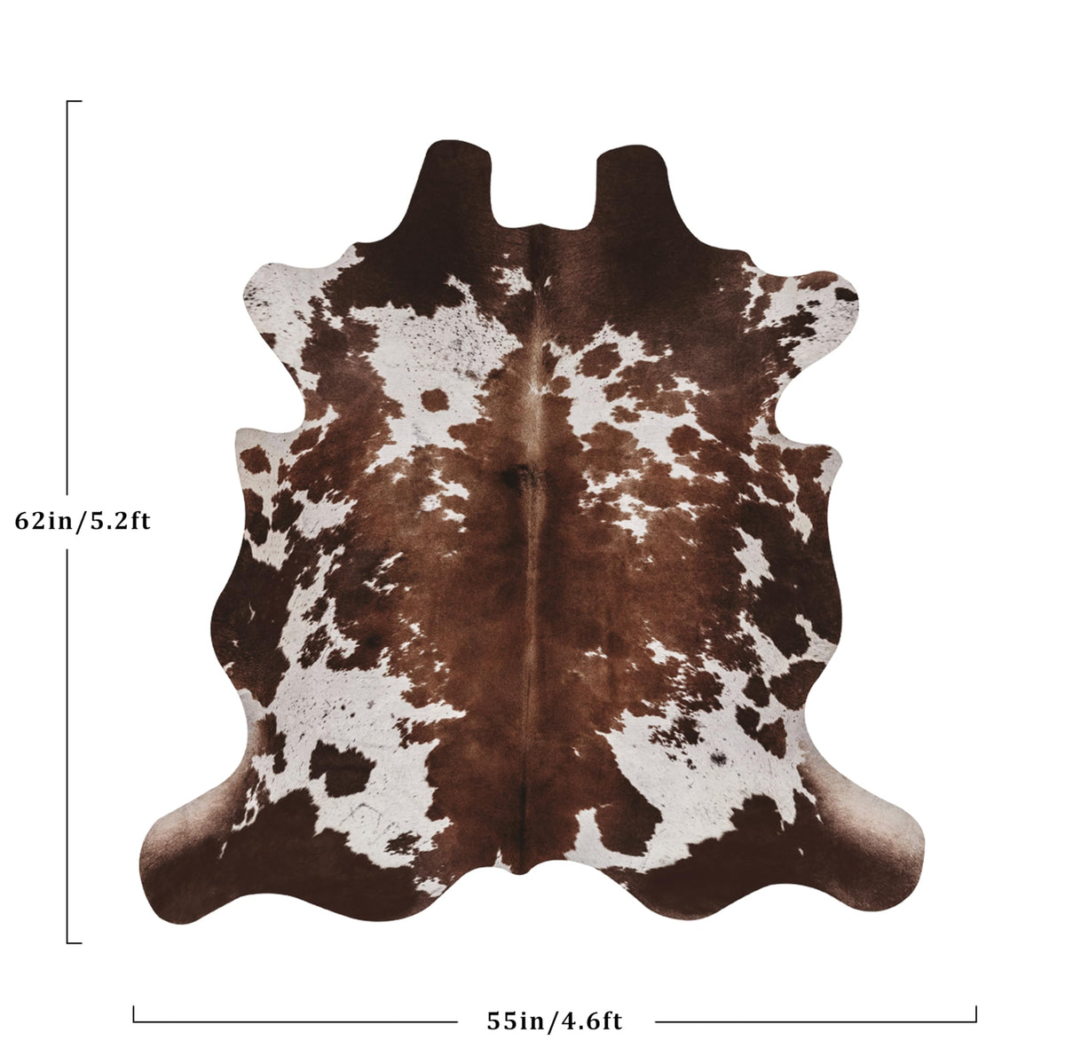 Warm Haven cow-hide rug cow print used in a bedroom for warm ambiance and versatile styling.