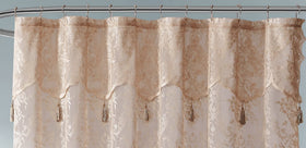 Warm Home Designs tassels and valance accent the curtain with classic elegance.