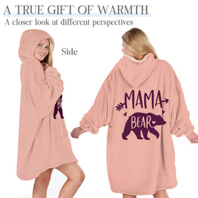 Soft fleece texture of the Warmstorey Mama Bear Hoodie Blanket in pink