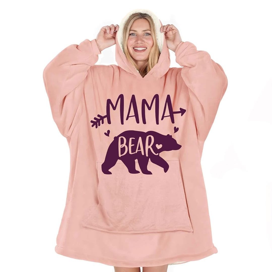 Warmstorey Mama Bear Hoodie Blanket pink worn as a cozy wrap for chilly evenings
