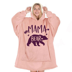 Warmstorey Mama Bear Hoodie Blanket pink worn as a cozy wrap for chilly evenings