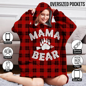 Warmstorey Mama Bear Hoodie Blanket on couch during movie night.